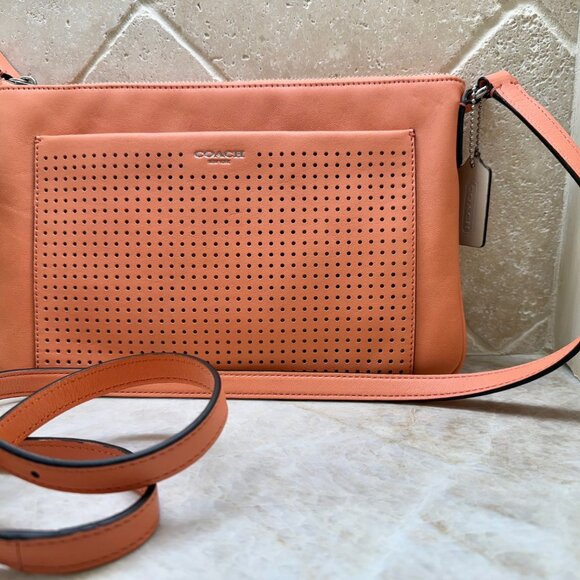 Coach Handbags - COACH 48979 Legacy Perforated East West Swingback Bag, Adjustable Strap, Coral